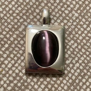 Silver Modernist purple moon glow pendant.